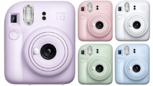 A picture of five Polaroid camers in different colours